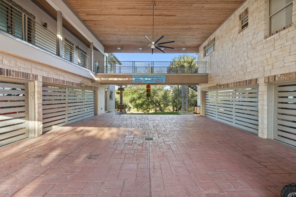 805 Brooks Hollow Road Lakeway, TX 78734 - Photo 17 of 38 a view of a pathway along a building