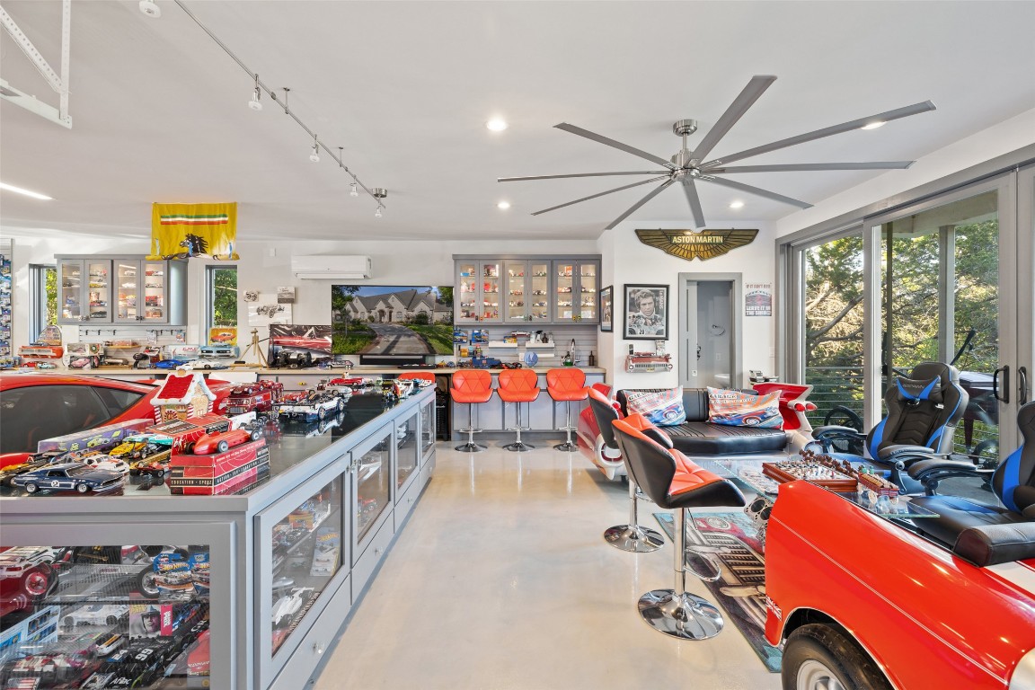 805 Brooks Hollow Road Lakeway, TX 78734 - Photo 24 of 38 a view of a room with gym equipment