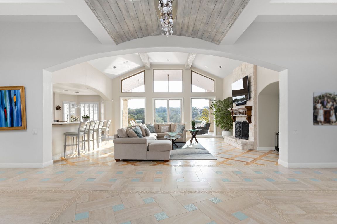 805 Brooks Hollow Road Lakeway, TX 78734 - Photo 3 of 38 a living room with furniture and a large window