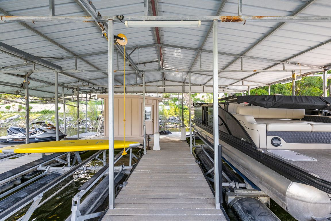 805 Brooks Hollow Road Lakeway, TX 78734 - Photo 31 of 38 a view of a swimming pool with seating area and furniture