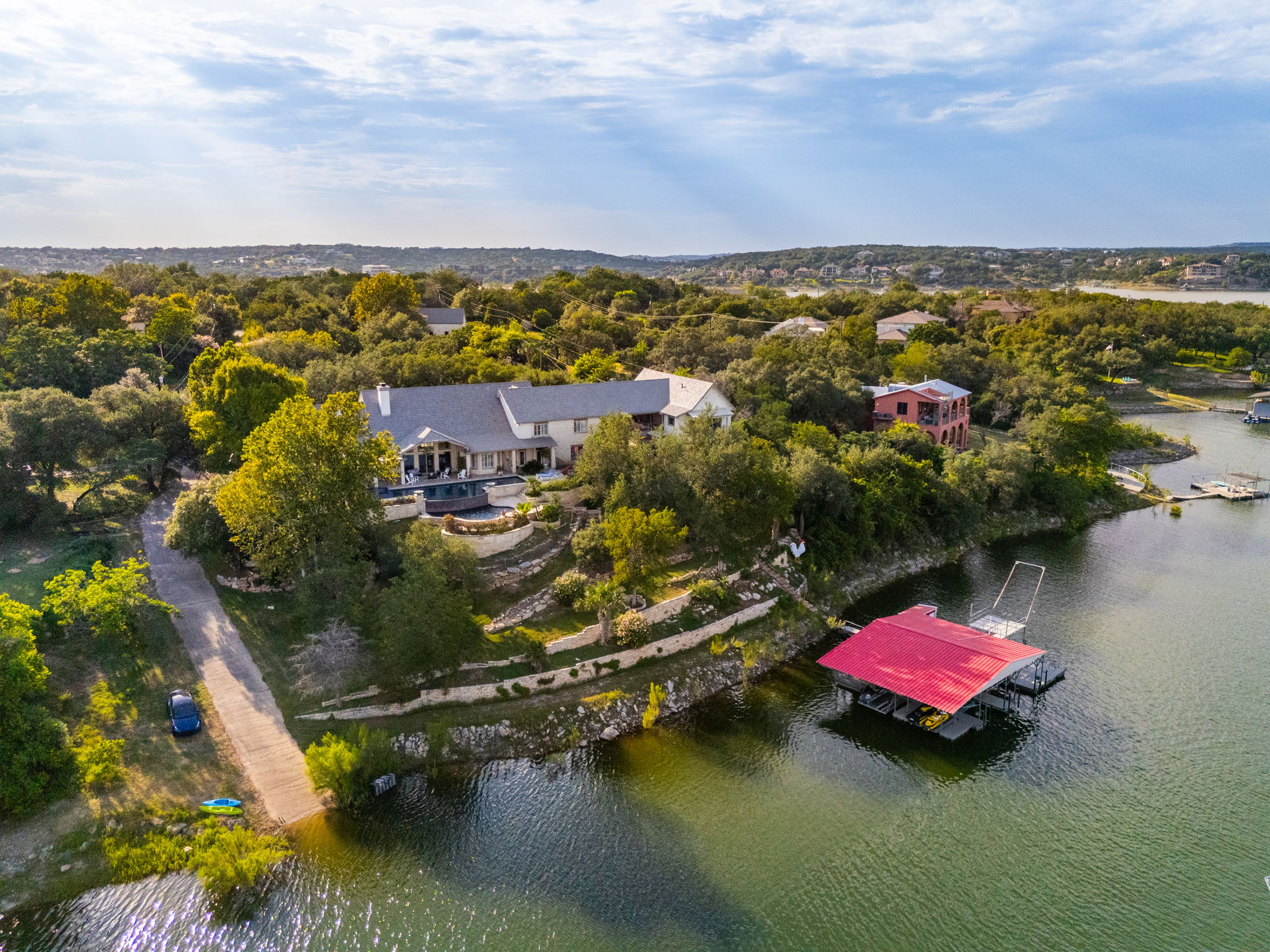 805 Brooks Hollow Road Lakeway, TX 78734 - Photo 35 of 38 an aerial view of residential houses with outdoor space
