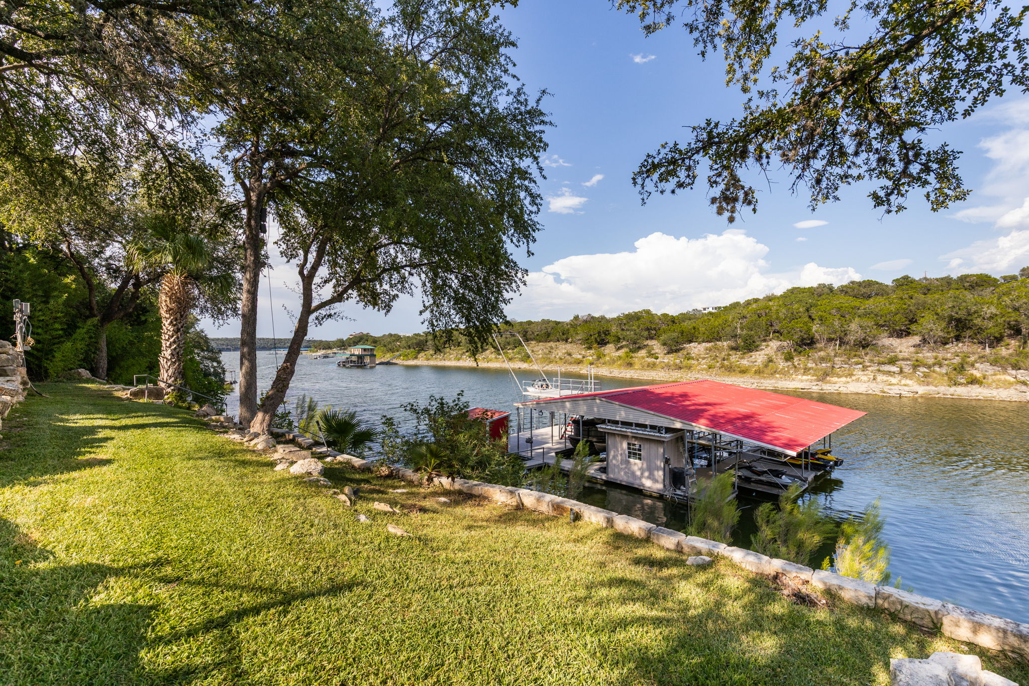 805 Brooks Hollow Road Lakeway, TX 78734 - Photo 37 of 38 a view of a swimming pool with a yard
