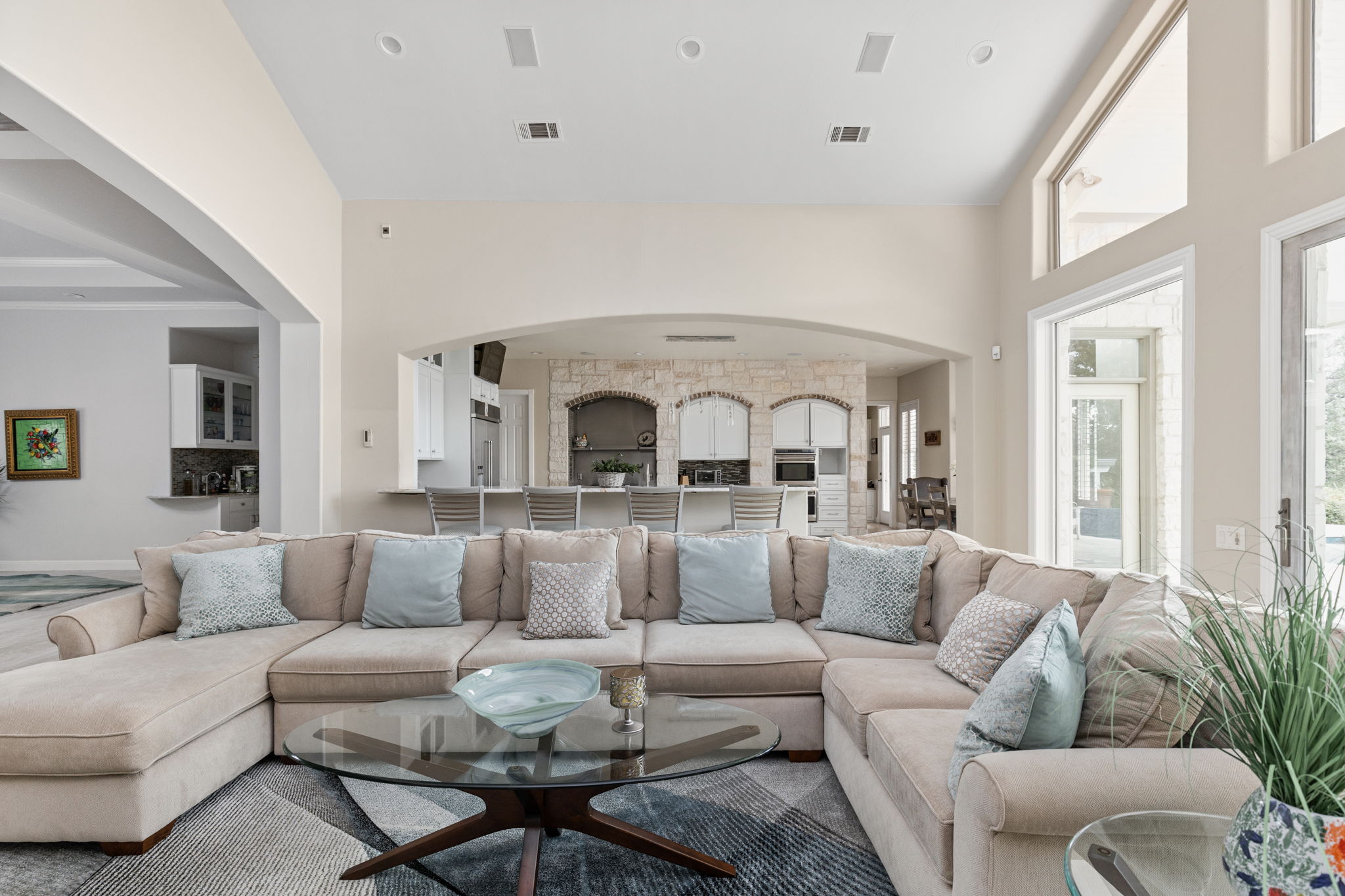 805 Brooks Hollow Road Lakeway, TX 78734 - Photo 9 of 38 a living room with furniture and a large window