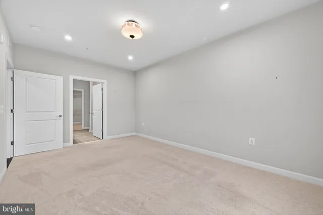 a bathroom with a shower and a sink