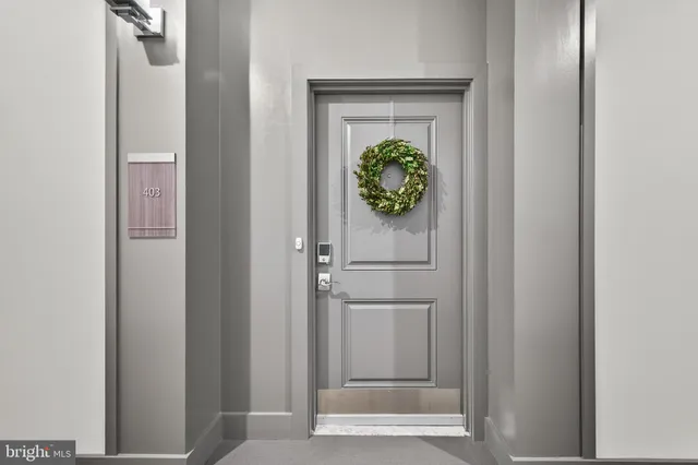 a kitchen with a sink stainless steel appliances and cabinets