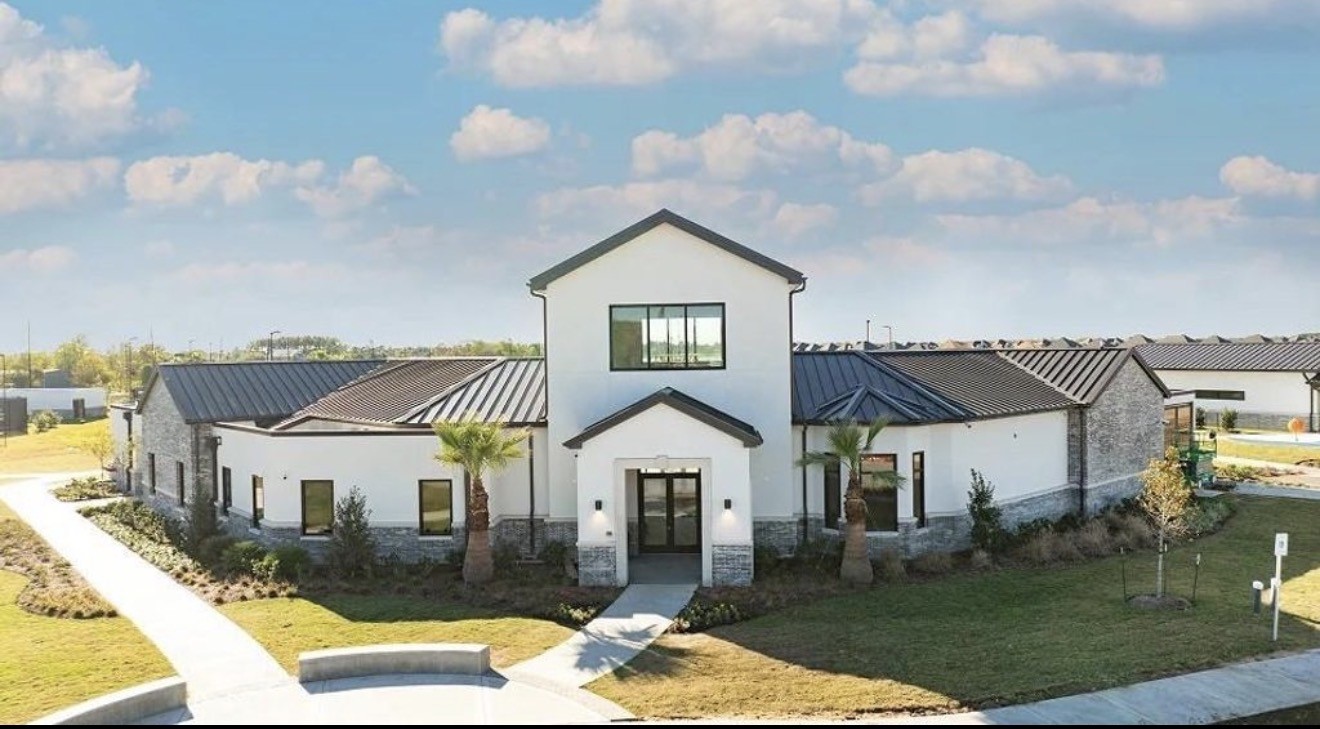 2207 Salinas Drive Rosharon, TX 77583 - Photo 2 of 6 a view of a big house with a big yard and large trees