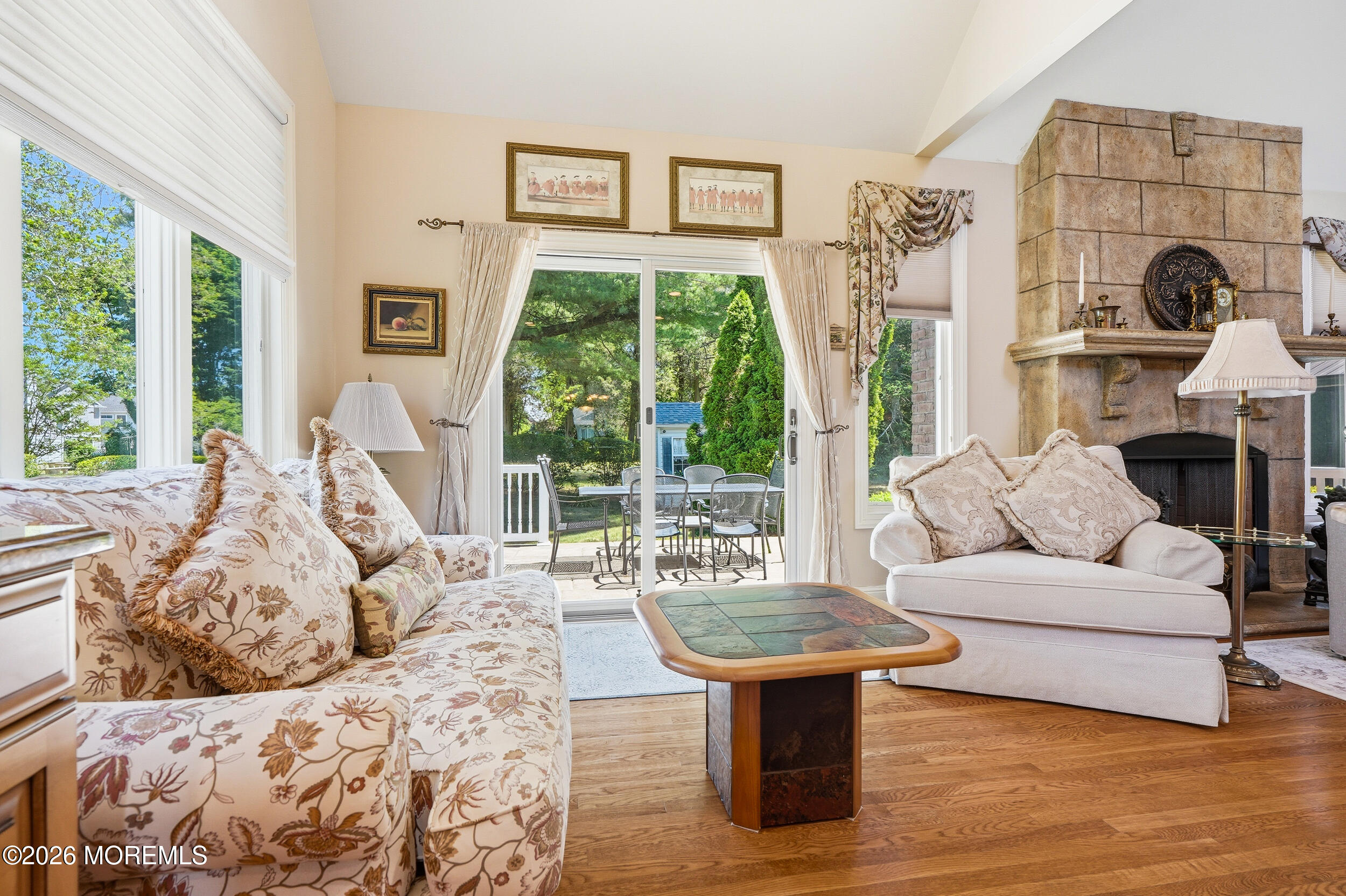 478 Rickey Lane Long Branch, NJ 07740 - Photo 27 of 64 a living room with furniture a large window and a fireplace