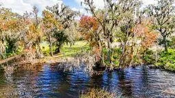 a view of swimming pool with an outdoor space and seating area