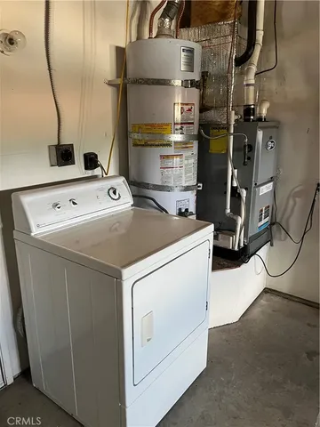 a utility room with cabinets