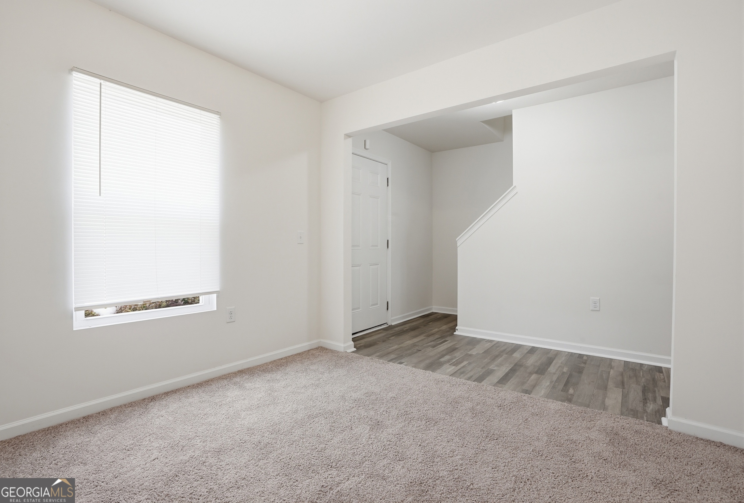 225 Rendell Lane Hinesville, GA 31313 - Photo 6 of 33 an empty room with windows