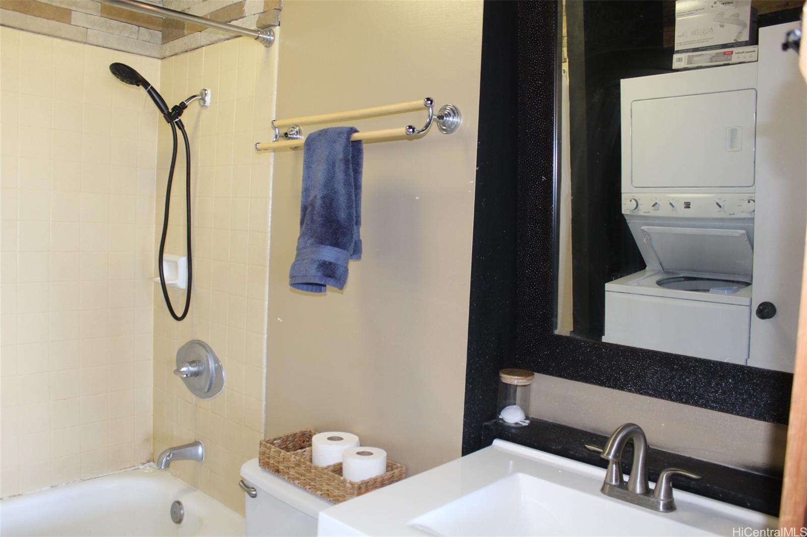 775 Kinalau Place, Unit 2107 Honolulu, HI 96813 - Photo 11 of 13 a bathroom with a sink vanity and toilet