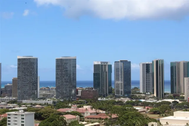 a view of a city with tall buildings