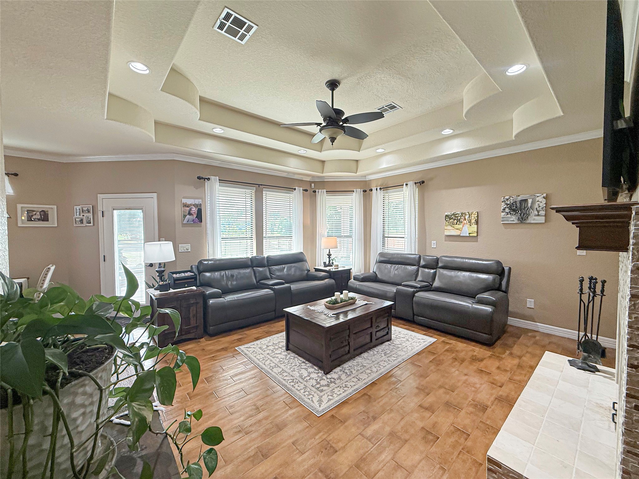 807 Mill Road Angleton, TX 77515 - Photo 15 of 46 Custom built-ins and expansive windows frame beautiful outdoor scenery.