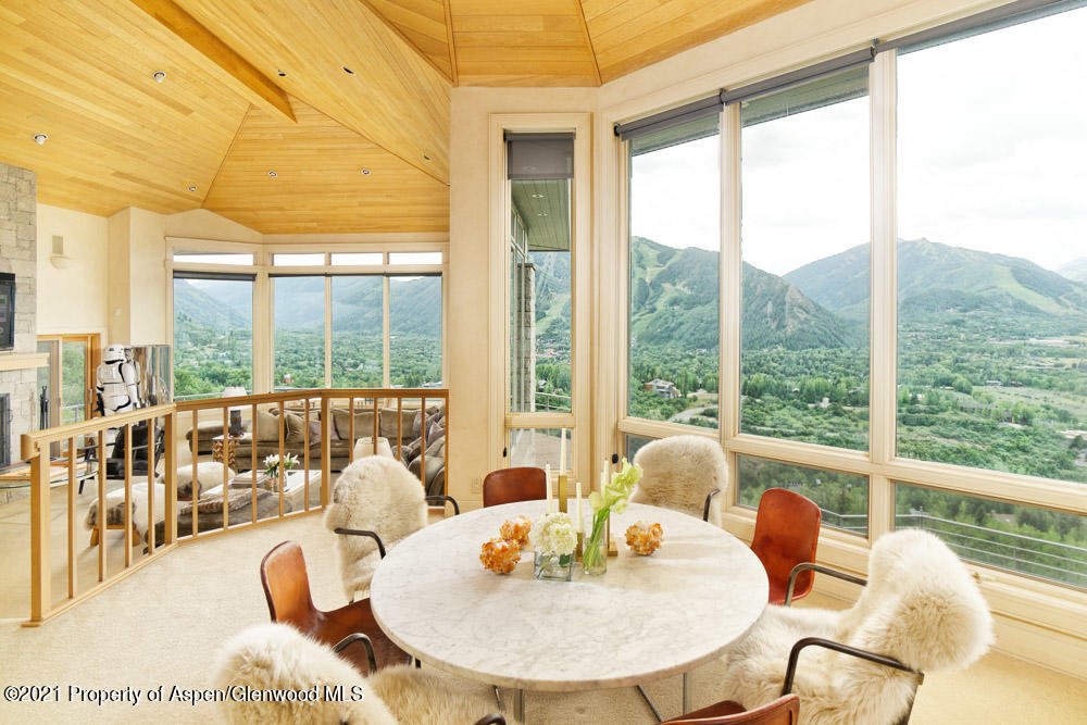 200 West Reds Road Aspen, CO 81611 - Photo 11 of 31 a dining room with furniture and a window