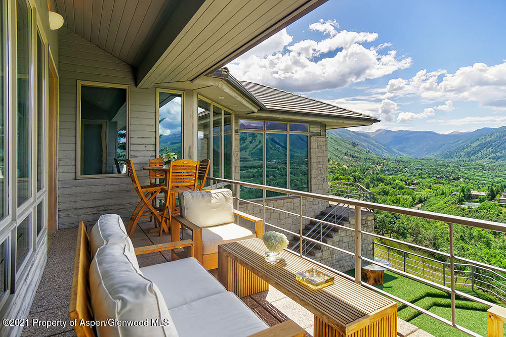 200 West Reds Road Aspen, CO 81611 - Photo 15 of 31 a view of a chairs and table in the balcony