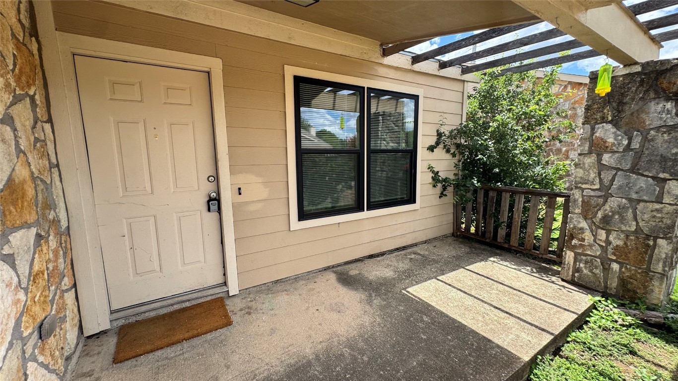 1304 Conway Drive, Unit B San Marcos, TX 78666 - Photo 13 of 16 a view of backyard with porch