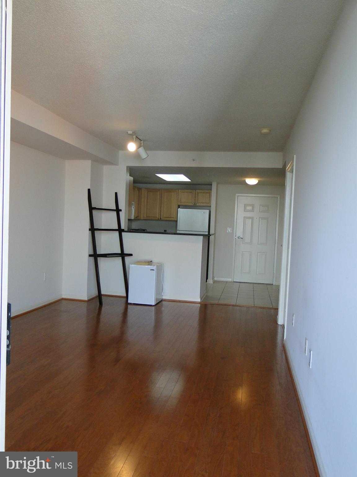 2726 Gallows Road, Unit 611 Vienna, VA 22180 - Photo 5 of 29 a view of a hallway with wooden floor