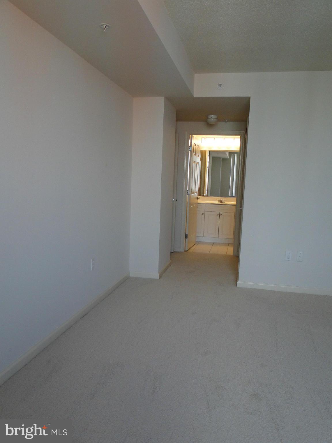 2726 Gallows Road, Unit 611 Vienna, VA 22180 - Photo 10 of 29 a view of empty room with window