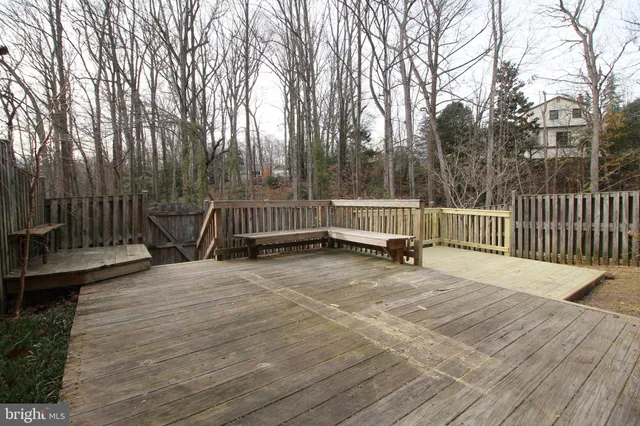 a view of backyard with deck