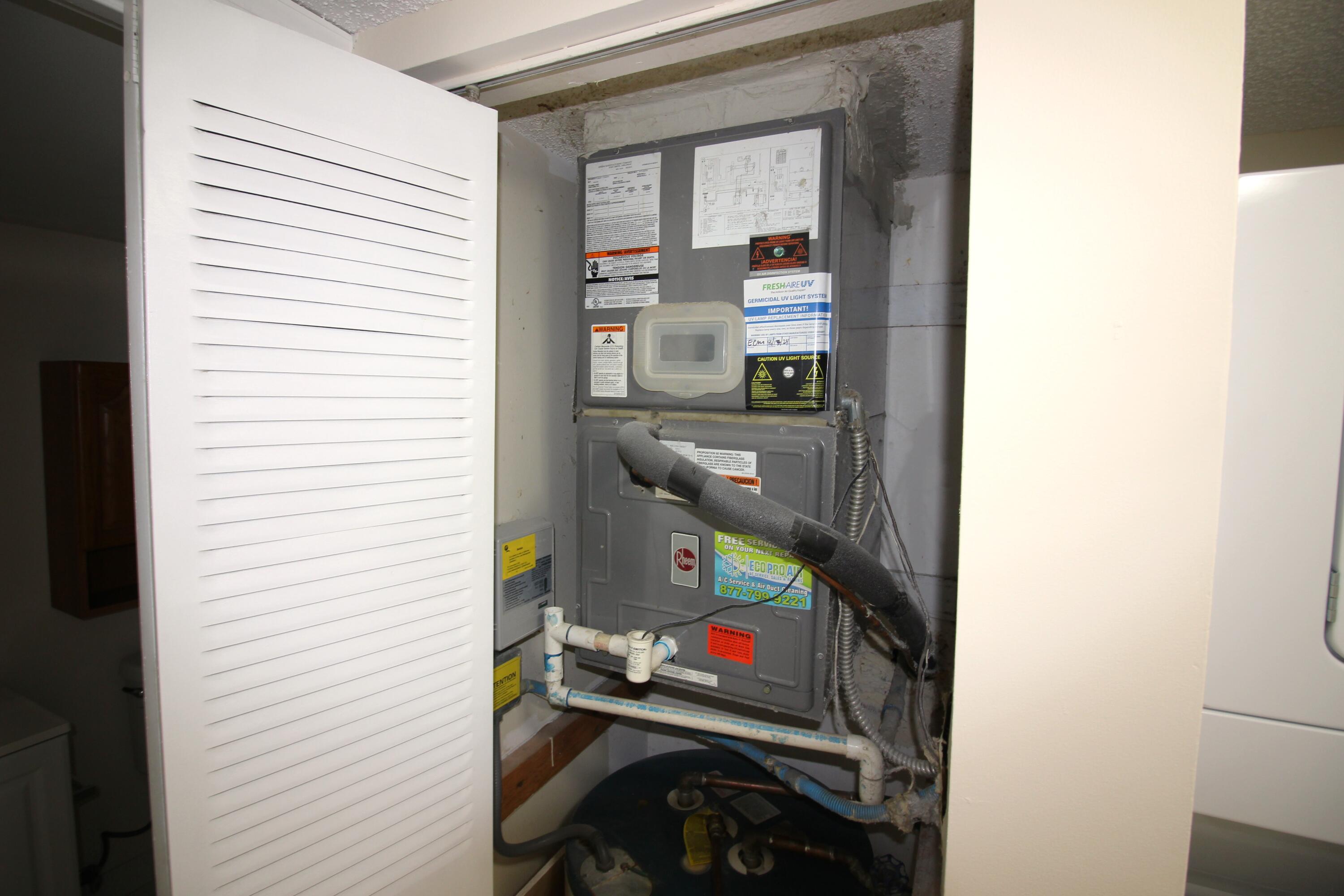 320 Olivewood Place, Unit O115 Boca Raton, FL 33431 - Photo 18 of 56 a room with a wooden floor and a window