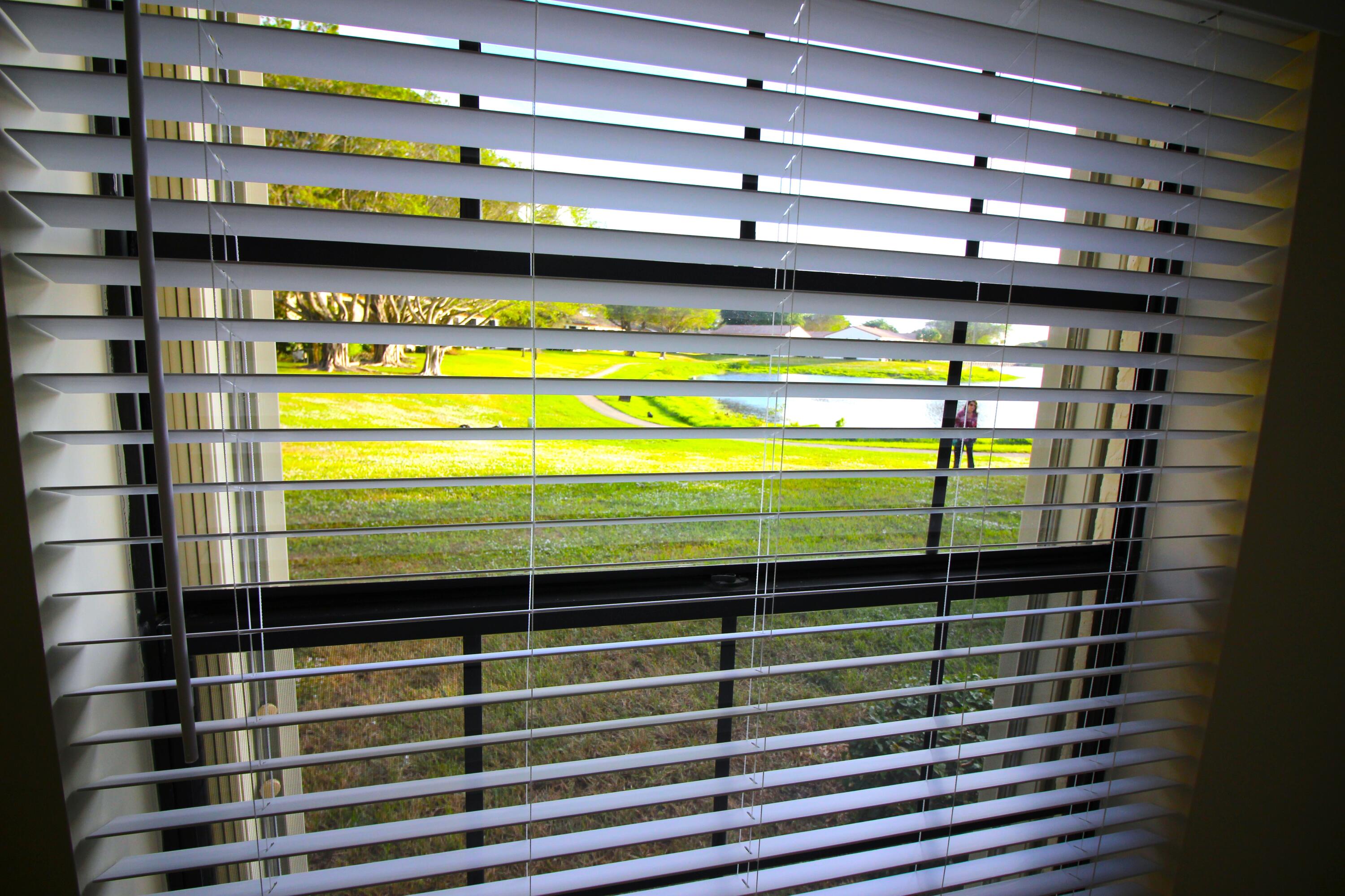 320 Olivewood Place, Unit O115 Boca Raton, FL 33431 - Photo 22 of 56 a close view of water heater and a window