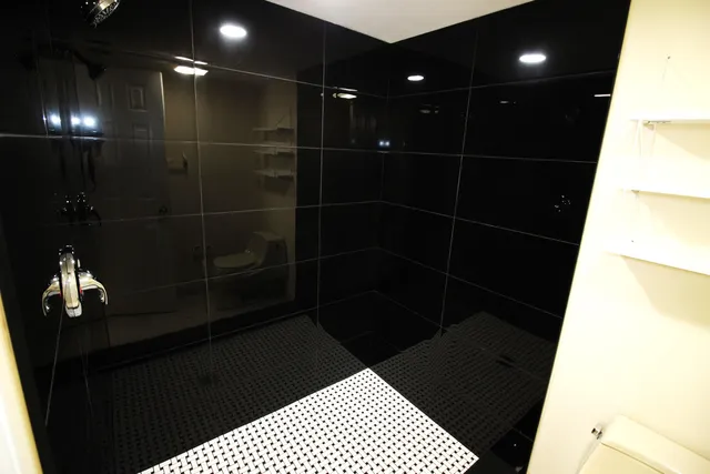 a view of a room with racks on the wall