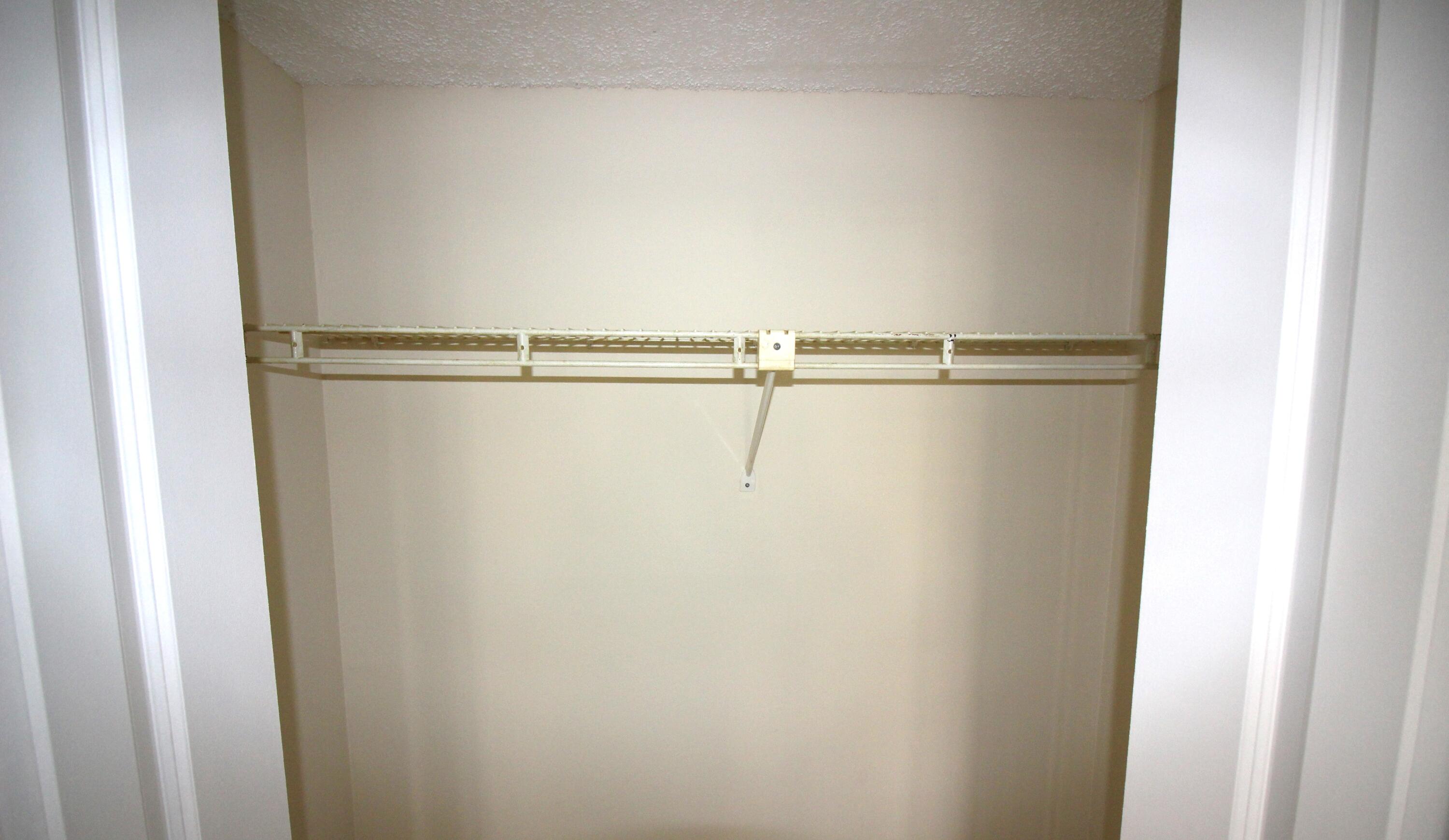 320 Olivewood Place, Unit O115 Boca Raton, FL 33431 - Photo 33 of 56 a view of a room with racks on the wall