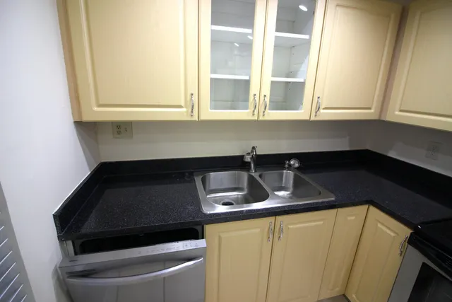 a kitchen with a stove and a microwave