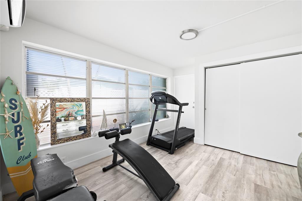 1357 Southwest 4th Terrace Pompano Beach, FL 33060 - Photo 17 of 25 a view of a room with gym equipment