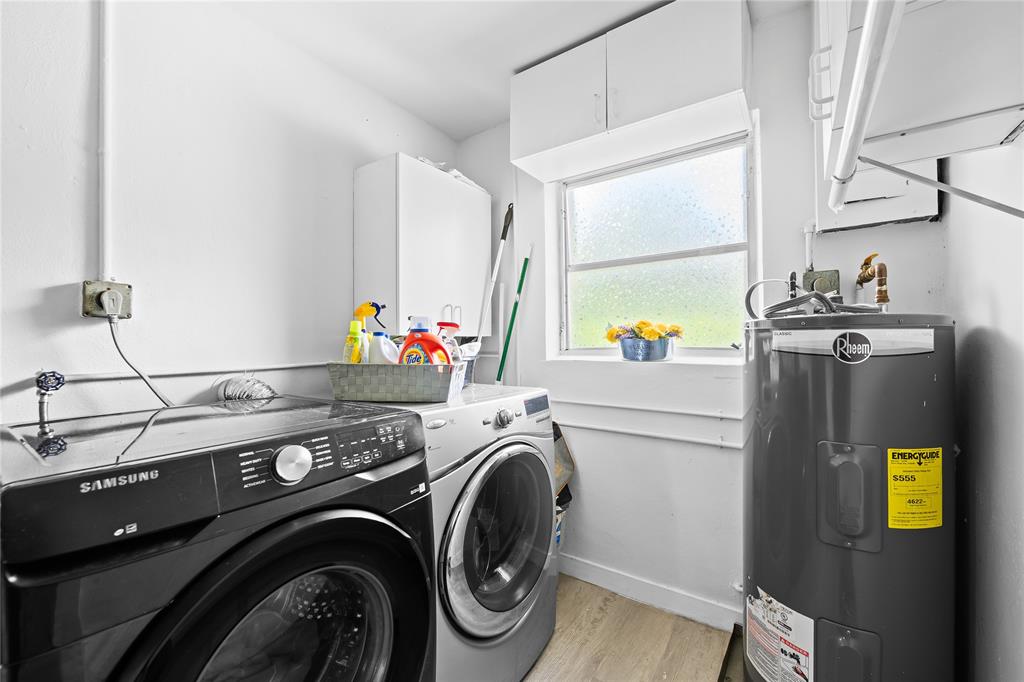 1357 Southwest 4th Terrace Pompano Beach, FL 33060 - Photo 18 of 25 a utility room with dryer and washer