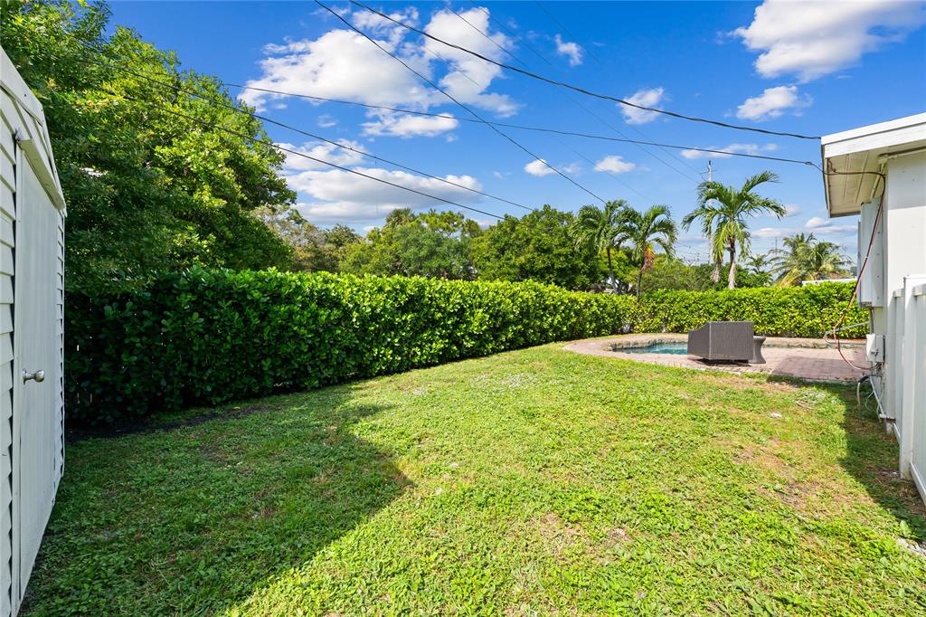 1357 Southwest 4th Terrace Pompano Beach, FL 33060 - Photo 23 of 25 a view of a backyard of the house
