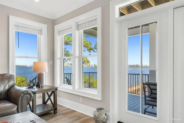 a view of a balcony with furniture