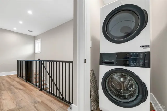 a bedroom with two beds and a window