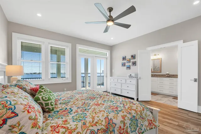 a bedroom with a bed and a lamp