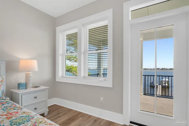 a bathroom with double vanity sinks and a mirror