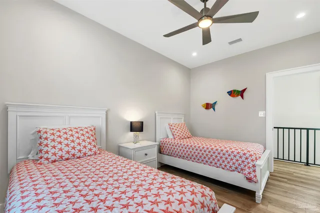 a view of a building with garden and sitting area