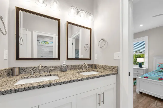 a view of a roof deck with table and chairs