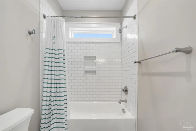 a front view of a house with a garage