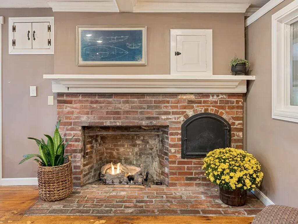 557 Coles Hill Road Wells, ME 04090 - Photo 11 of 35 Dining Room Fireplace