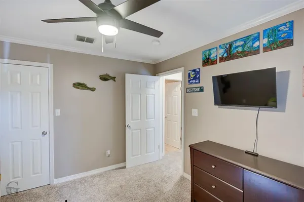 a living room with flat screen tv