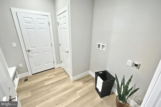 a spacious bedroom with a bed and a couch