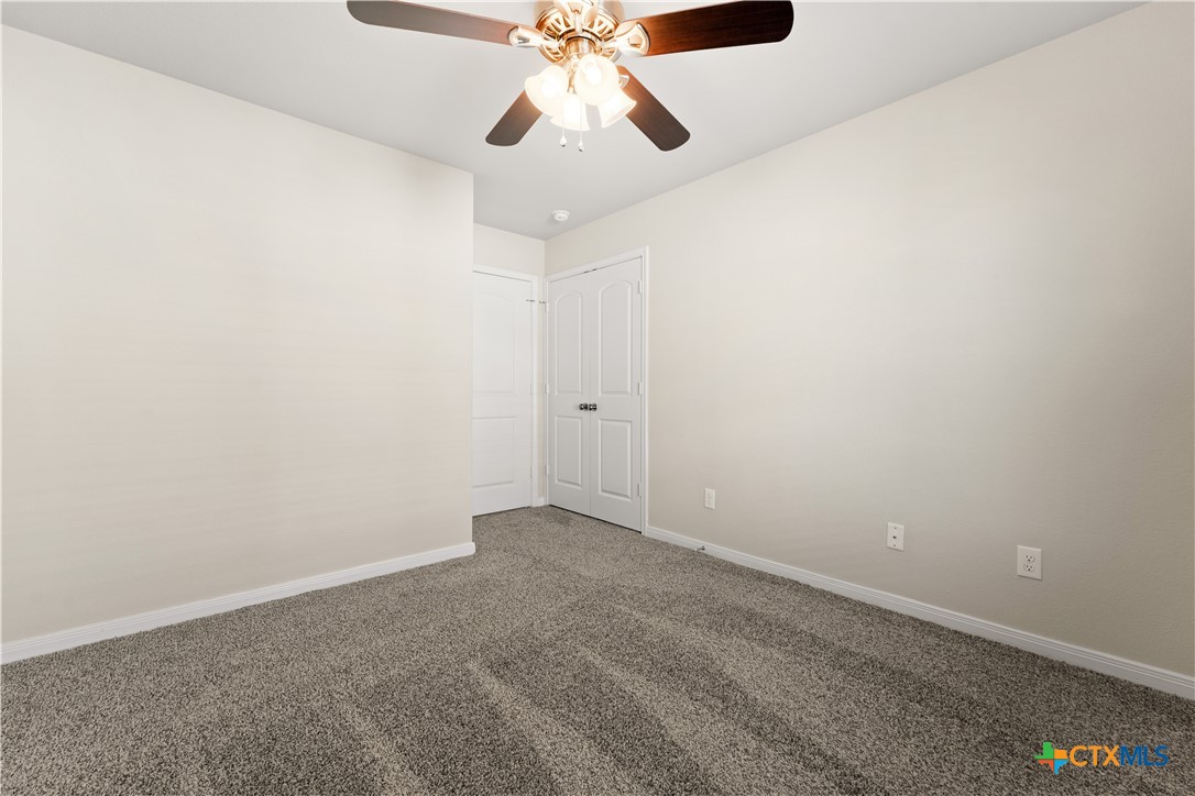 4124 Riata Ranch Road Waco, TX 76705 - Photo 20 of 26 a view of an empty room