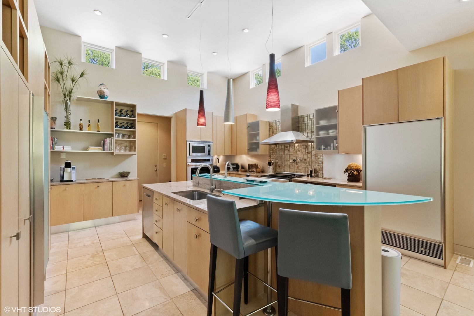 1632 Saunders Road Riverwoods, IL 60015 - Photo 17 of 38 a kitchen with stainless steel appliances a refrigerator a sink and white cabinets