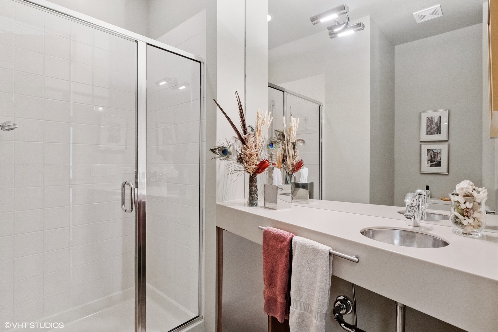 1632 Saunders Road Riverwoods, IL 60015 - Photo 29 of 38 a bathroom with a sink vanity and a mirror