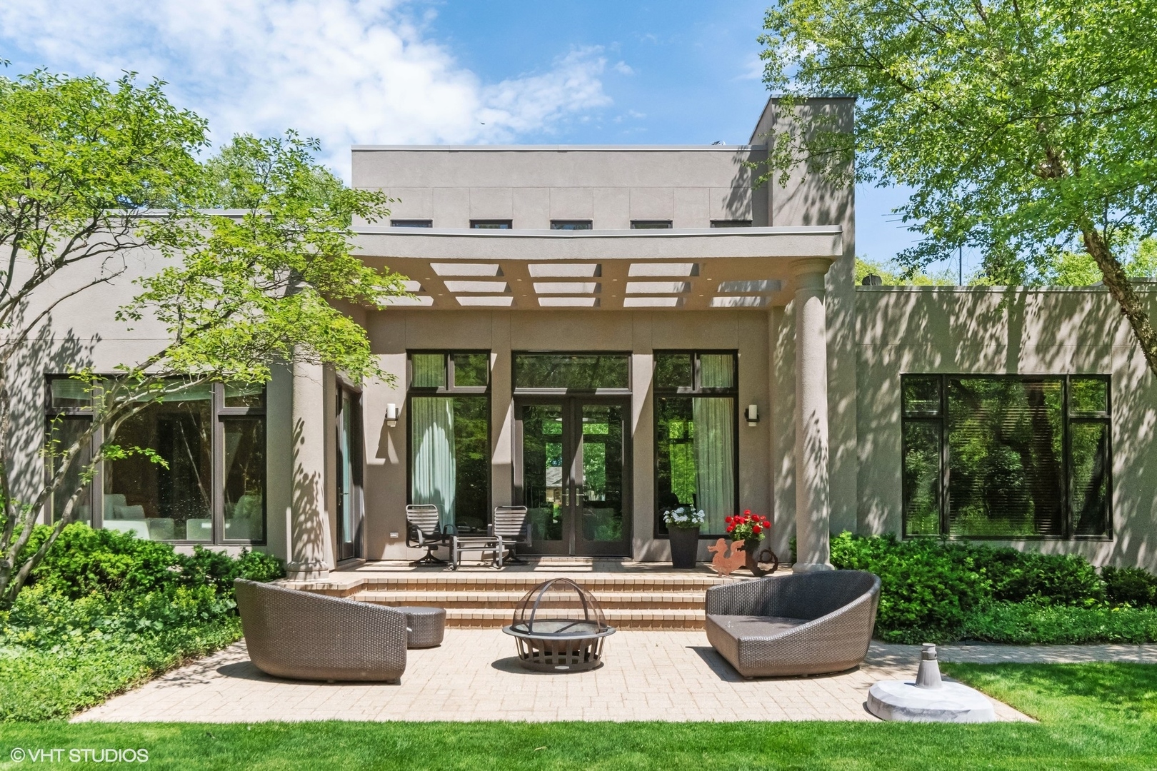 1632 Saunders Road Riverwoods, IL 60015 - Photo 6 of 38 a view of a house with backyard and porch