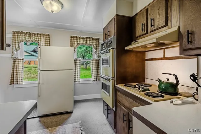 $595,000 | 118 East Avenue, Webb, NY 13331