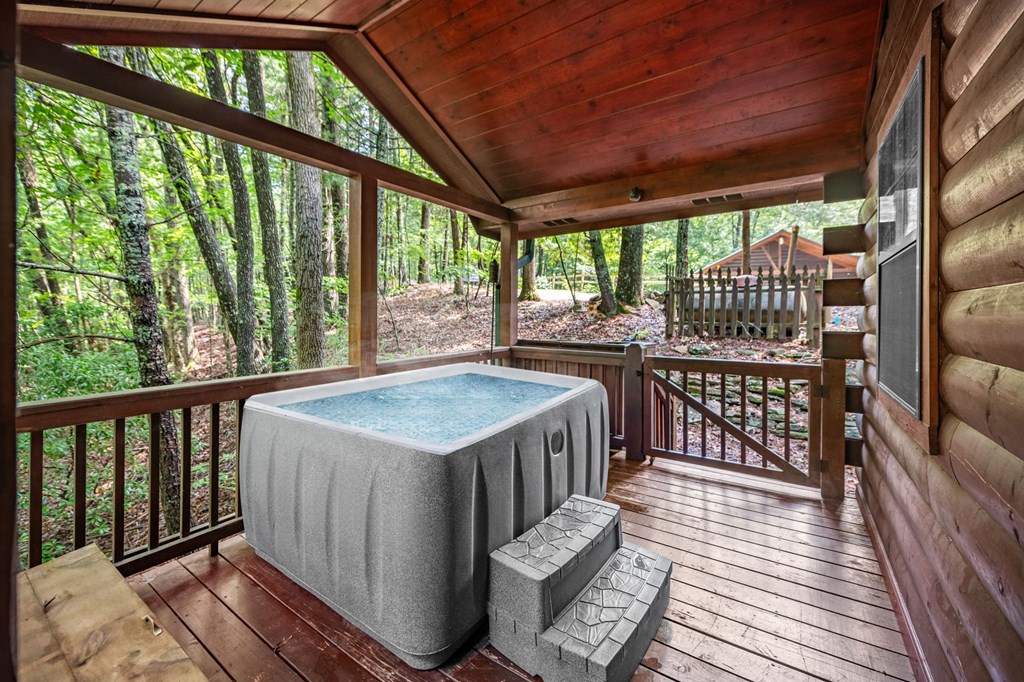 120 Tomahawk Blue Ridge Blue Ridge, GA 30513 - Photo 20 of 56 a view of a balcony with furniture and wooden floor