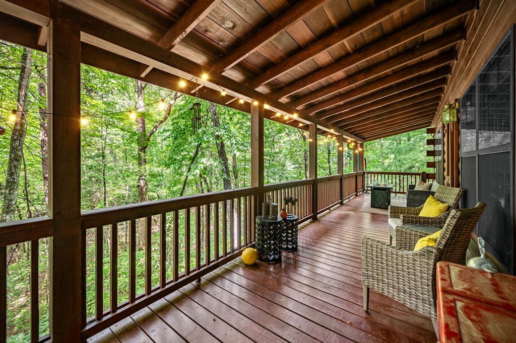 120 Tomahawk Blue Ridge Blue Ridge, GA 30513 - Photo 8 of 56 a view of balcony with wooden floor