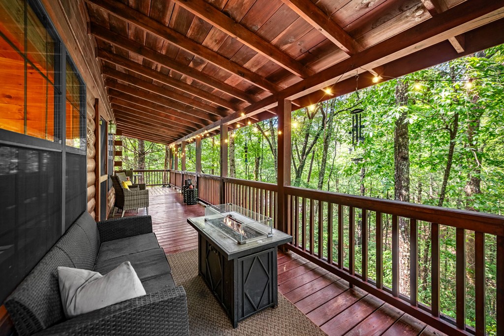 120 Tomahawk Blue Ridge Blue Ridge, GA 30513 - Photo 10 of 56 a view of balcony with wooden floor and outdoor seating