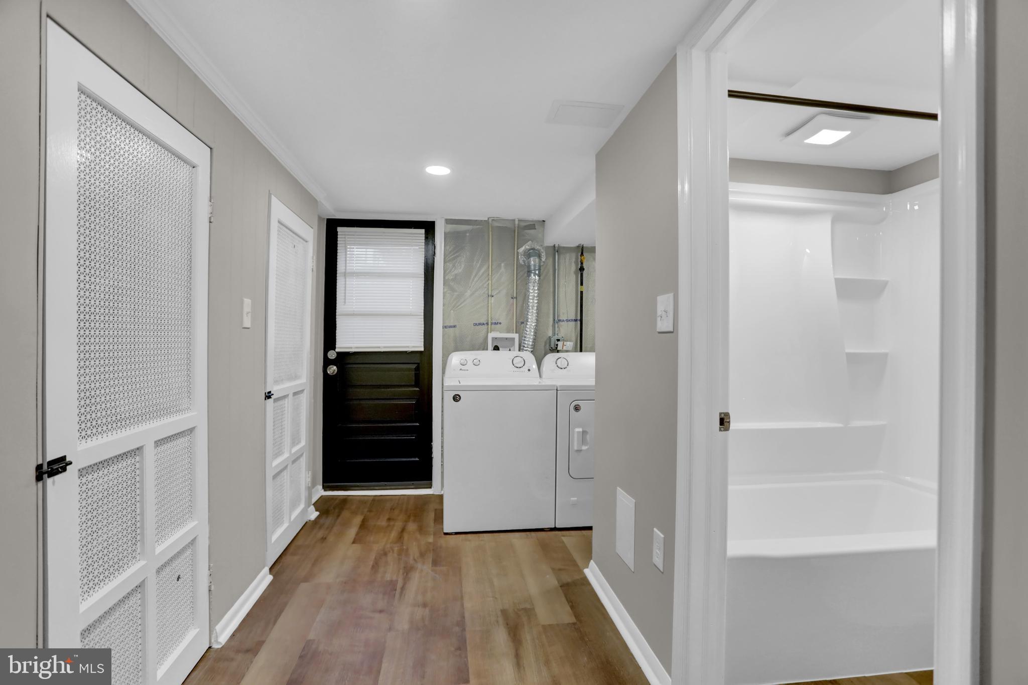 2857 Plainfield Road Baltimore, MD 21222 - Photo 22 of 38 a bathroom with a sink and a mirror